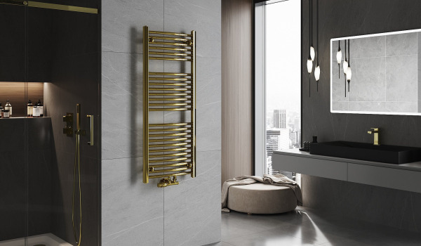 Color, estilo y funcionalidad - el radiador dorado en el baño