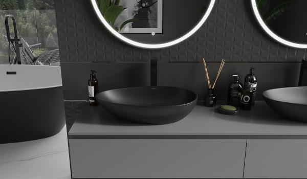 Lavabos de conglomerado en un baño gris y negro